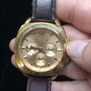 Coach wristwatch with purple leather band